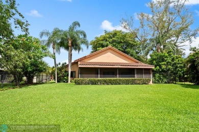 Welcome to the Oak Knoll Ridge neighborhood of Davie. This on Pine Island Ridge Country Club in Florida - for sale on GolfHomes.com, golf home, golf lot