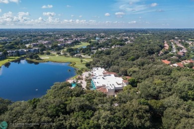 Welcome to the Oak Knoll Ridge neighborhood of Davie. This on Pine Island Ridge Country Club in Florida - for sale on GolfHomes.com, golf home, golf lot