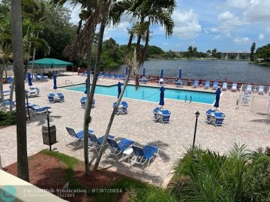 Welcome to the Oak Knoll Ridge neighborhood of Davie. This on Pine Island Ridge Country Club in Florida - for sale on GolfHomes.com, golf home, golf lot