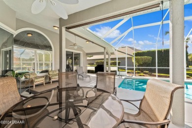 IMPECCABLE WATERFRONT POOL HOME!! Welcome to your on Plantation Bay Golf and Country Club in Florida - for sale on GolfHomes.com, golf home, golf lot