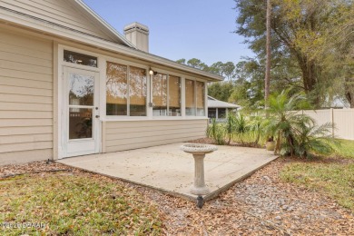 Welcome to your ideal home on Treetop Trail in the exclusive on Plantation Bay Golf and Country Club in Florida - for sale on GolfHomes.com, golf home, golf lot
