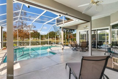 IMPECCABLE WATERFRONT POOL HOME!! Welcome to your on Plantation Bay Golf and Country Club in Florida - for sale on GolfHomes.com, golf home, golf lot