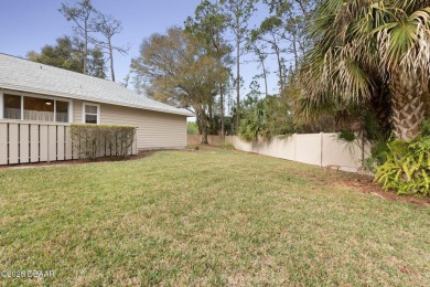 Welcome to your ideal home on Treetop Trail in the exclusive on Plantation Bay Golf and Country Club in Florida - for sale on GolfHomes.com, golf home, golf lot