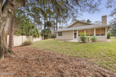 Welcome to your ideal home on Treetop Trail in the exclusive on Plantation Bay Golf and Country Club in Florida - for sale on GolfHomes.com, golf home, golf lot