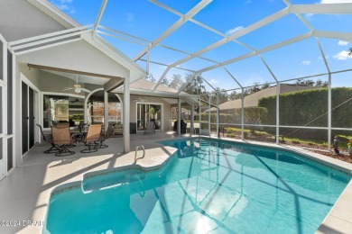 IMPECCABLE WATERFRONT POOL HOME!! Welcome to your on Plantation Bay Golf and Country Club in Florida - for sale on GolfHomes.com, golf home, golf lot