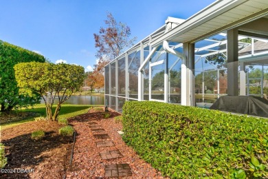 IMPECCABLE WATERFRONT POOL HOME!! Welcome to your on Plantation Bay Golf and Country Club in Florida - for sale on GolfHomes.com, golf home, golf lot