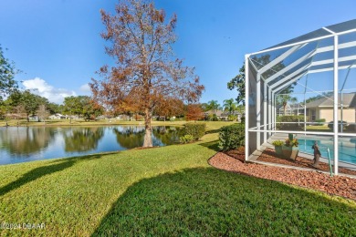 IMPECCABLE WATERFRONT POOL HOME!! Welcome to your on Plantation Bay Golf and Country Club in Florida - for sale on GolfHomes.com, golf home, golf lot