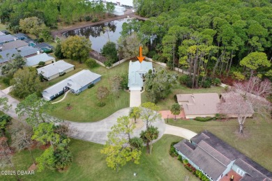 Welcome to your ideal home on Treetop Trail in the exclusive on Plantation Bay Golf and Country Club in Florida - for sale on GolfHomes.com, golf home, golf lot