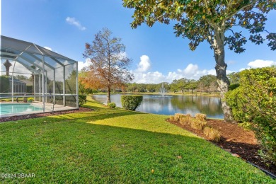 IMPECCABLE WATERFRONT POOL HOME!! Welcome to your on Plantation Bay Golf and Country Club in Florida - for sale on GolfHomes.com, golf home, golf lot