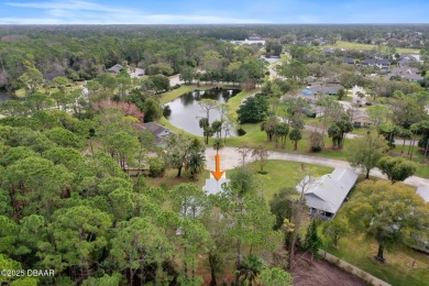 Welcome to your ideal home on Treetop Trail in the exclusive on Plantation Bay Golf and Country Club in Florida - for sale on GolfHomes.com, golf home, golf lot