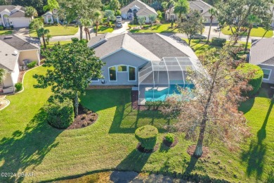 IMPECCABLE WATERFRONT POOL HOME!! Welcome to your on Plantation Bay Golf and Country Club in Florida - for sale on GolfHomes.com, golf home, golf lot