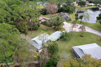 Welcome to your ideal home on Treetop Trail in the exclusive on Plantation Bay Golf and Country Club in Florida - for sale on GolfHomes.com, golf home, golf lot