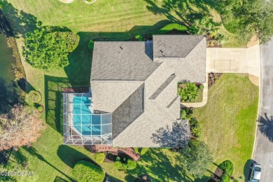 IMPECCABLE WATERFRONT POOL HOME!! Welcome to your on Plantation Bay Golf and Country Club in Florida - for sale on GolfHomes.com, golf home, golf lot