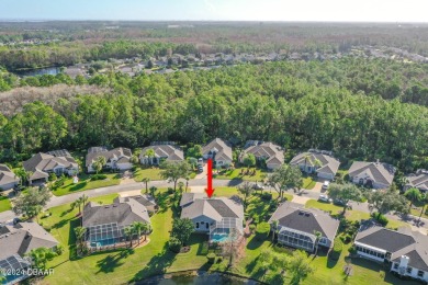 IMPECCABLE WATERFRONT POOL HOME!! Welcome to your on Plantation Bay Golf and Country Club in Florida - for sale on GolfHomes.com, golf home, golf lot