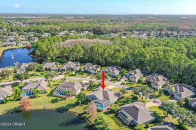 IMPECCABLE WATERFRONT POOL HOME!! Welcome to your on Plantation Bay Golf and Country Club in Florida - for sale on GolfHomes.com, golf home, golf lot