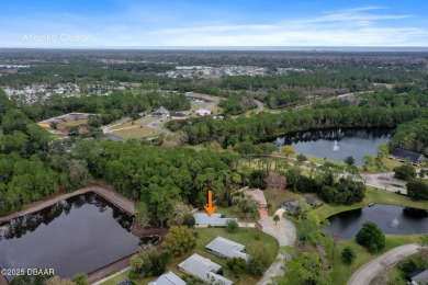 Welcome to your ideal home on Treetop Trail in the exclusive on Plantation Bay Golf and Country Club in Florida - for sale on GolfHomes.com, golf home, golf lot