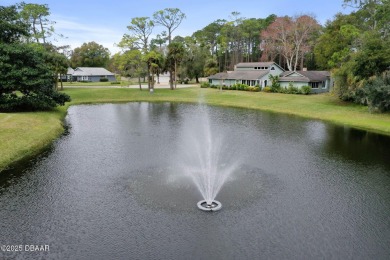 Welcome to your ideal home on Treetop Trail in the exclusive on Plantation Bay Golf and Country Club in Florida - for sale on GolfHomes.com, golf home, golf lot