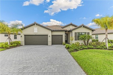 Experience the beauty of living on a golf course in this on Valencia Golf and Country Club in Florida - for sale on GolfHomes.com, golf home, golf lot