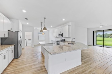 Experience the beauty of living on a golf course in this on Valencia Golf and Country Club in Florida - for sale on GolfHomes.com, golf home, golf lot