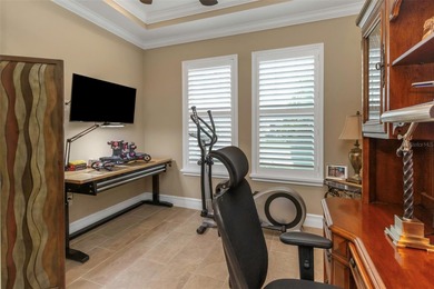 WATER VIEW LOT offering an expansive 425-ft serene view across on Seven Springs Golf and Country Club in Florida - for sale on GolfHomes.com, golf home, golf lot