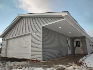 Brand New Home!  This 3 bedroom, 2 bath home is centrally on Charlevoix Golf and Country Club in Michigan - for sale on GolfHomes.com, golf home, golf lot