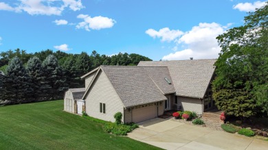 Wake up to sweeping fairway views and end your day poolside at on Briar Leaf Golf Club in Indiana - for sale on GolfHomes.com, golf home, golf lot