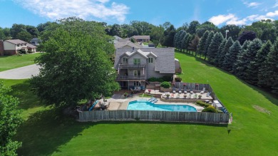 Wake up to sweeping fairway views and end your day poolside at on Briar Leaf Golf Club in Indiana - for sale on GolfHomes.com, golf home, golf lot