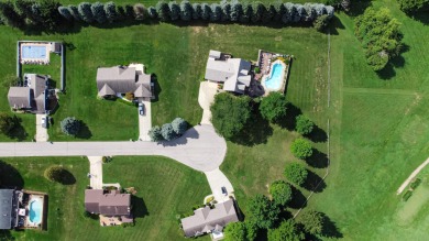 Wake up to sweeping fairway views and end your day poolside at on Briar Leaf Golf Club in Indiana - for sale on GolfHomes.com, golf home, golf lot