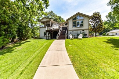 Spectacular Sunsets and Panoramic views of Lake Wylie's main on Tega Cay Golf Club in South Carolina - for sale on GolfHomes.com, golf home, golf lot
