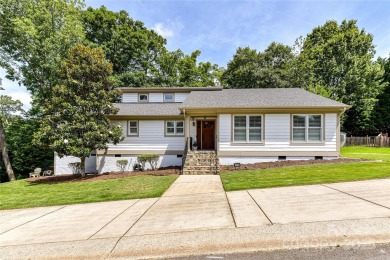 Spectacular Sunsets and Panoramic views of Lake Wylie's main on Tega Cay Golf Club in South Carolina - for sale on GolfHomes.com, golf home, golf lot