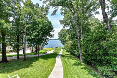 Spectacular Sunsets and Panoramic views of Lake Wylie's main on Tega Cay Golf Club in South Carolina - for sale on GolfHomes.com, golf home, golf lot