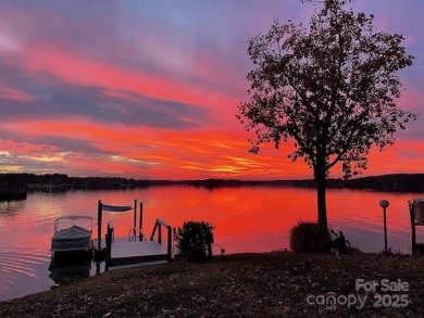 Spectacular Sunsets and Panoramic views of Lake Wylie's main on Tega Cay Golf Club in South Carolina - for sale on GolfHomes.com, golf home, golf lot