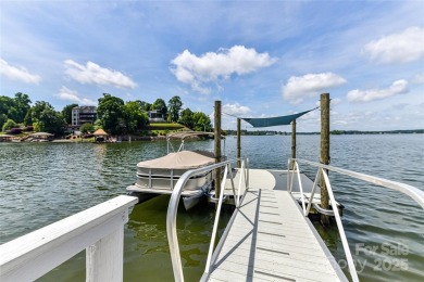 Spectacular Sunsets and Panoramic views of Lake Wylie's main on Tega Cay Golf Club in South Carolina - for sale on GolfHomes.com, golf home, golf lot