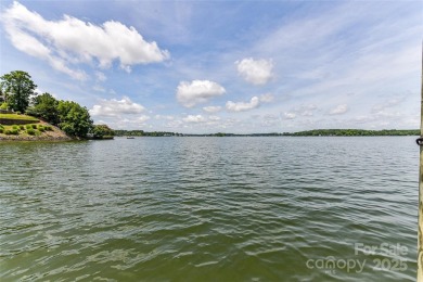 Spectacular Sunsets and Panoramic views of Lake Wylie's main on Tega Cay Golf Club in South Carolina - for sale on GolfHomes.com, golf home, golf lot