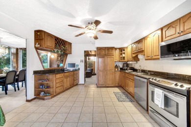 Wake up to sweeping fairway views and end your day poolside at on Briar Leaf Golf Club in Indiana - for sale on GolfHomes.com, golf home, golf lot