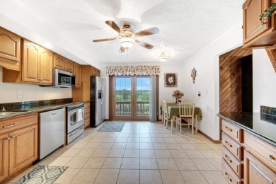 Wake up to sweeping fairway views and end your day poolside at on Briar Leaf Golf Club in Indiana - for sale on GolfHomes.com, golf home, golf lot