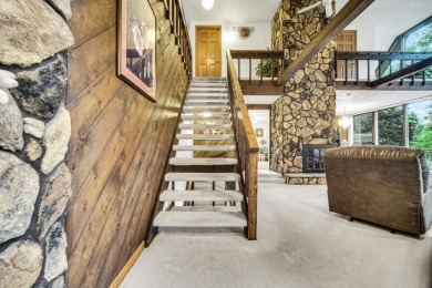 Wake up to sweeping fairway views and end your day poolside at on Briar Leaf Golf Club in Indiana - for sale on GolfHomes.com, golf home, golf lot