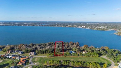 This partially cleared lake front lot is almost an acre and a on Deer Island Country Club in Florida - for sale on GolfHomes.com, golf home, golf lot