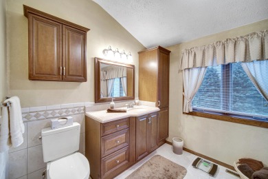 Wake up to sweeping fairway views and end your day poolside at on Briar Leaf Golf Club in Indiana - for sale on GolfHomes.com, golf home, golf lot