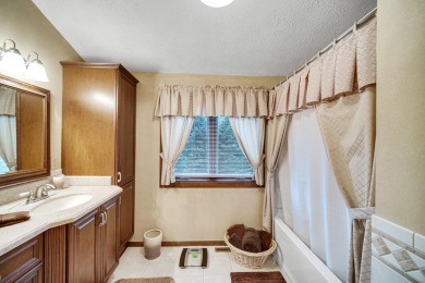 Wake up to sweeping fairway views and end your day poolside at on Briar Leaf Golf Club in Indiana - for sale on GolfHomes.com, golf home, golf lot