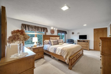 Wake up to sweeping fairway views and end your day poolside at on Briar Leaf Golf Club in Indiana - for sale on GolfHomes.com, golf home, golf lot