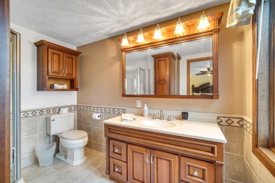 Wake up to sweeping fairway views and end your day poolside at on Briar Leaf Golf Club in Indiana - for sale on GolfHomes.com, golf home, golf lot