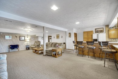 Wake up to sweeping fairway views and end your day poolside at on Briar Leaf Golf Club in Indiana - for sale on GolfHomes.com, golf home, golf lot