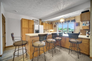 Wake up to sweeping fairway views and end your day poolside at on Briar Leaf Golf Club in Indiana - for sale on GolfHomes.com, golf home, golf lot