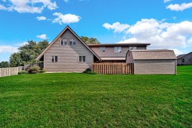 Wake up to sweeping fairway views and end your day poolside at on Briar Leaf Golf Club in Indiana - for sale on GolfHomes.com, golf home, golf lot