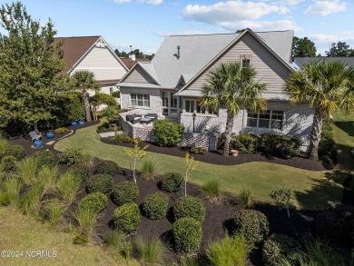 This home boasts captivating sunset views over the 3rd hole of on Cape Fear National At Brunswick Forest in North Carolina - for sale on GolfHomes.com, golf home, golf lot