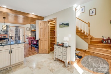 Enjoy a direct view of Big Bald Mountain from this spotless on Wolf Laurel Country Club in North Carolina - for sale on GolfHomes.com, golf home, golf lot