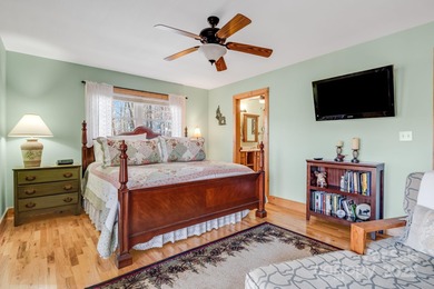 Enjoy a direct view of Big Bald Mountain from this spotless on Wolf Laurel Country Club in North Carolina - for sale on GolfHomes.com, golf home, golf lot