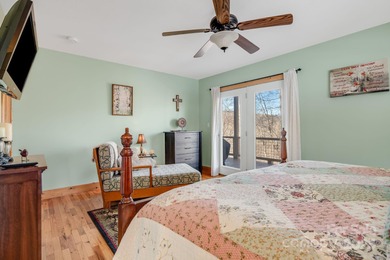 Enjoy a direct view of Big Bald Mountain from this spotless on Wolf Laurel Country Club in North Carolina - for sale on GolfHomes.com, golf home, golf lot