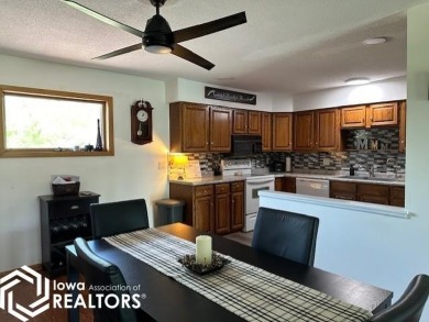 This charming 2 bedroom, 2 1/2 bath upper level condo offers the on Garner Golf and Country Club in Iowa - for sale on GolfHomes.com, golf home, golf lot